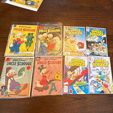Uncle Scrooge Comics-61 issues in total ranging from good to very good condition picture