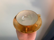 Havilland Limoges Three-Footed 24-karat gold plated porcelain TeaCup and Saucer picture