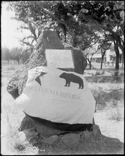 The Bear Flag draped and tied around the rock with the S.V.W.C. Be - Old Photo picture