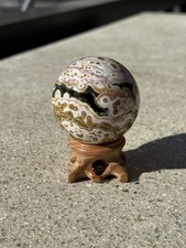 Ultra Rare 8th Vein Ocean Jasper Sphere Crystal With Wooden Stand 50mm picture