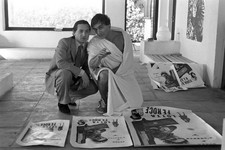 Leo Gullotta Gian Maria Volonte in front of some film posters in t- Old Photo picture