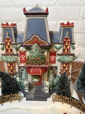Dept 56 North Pole series glacier park pavilion Animated Ice Skating Rink picture