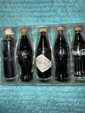 Evolution of the COCA COLA contour bottle miniature bottle set  1899-1961 — 1998 picture