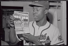 Hank Aaron looking at a picture of Bill Terry in 1930 Historic Old Photo picture