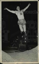1941 Press Photo Track star Boster shown mid-jump at an event - net21594 picture