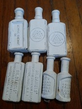 vintage Cast Iron Bottle lot of 7   picture