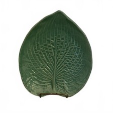 A contemporary, artist-signed Barbara Eigen ceramic leaf-shaped platter picture