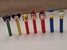 Vintage 1961 thru 1977  Lot Of 7 Disney Pez No Feet Austria & Hong Kong 3.4 &3.9 picture