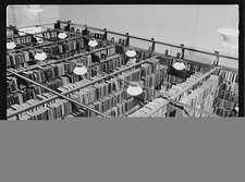 Library Bookshelves Interior 1950s Reading Room Aisle Black and White picture