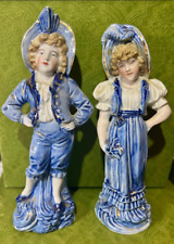 Vintage boy and girl figurines; blue wash with gold accents; 8