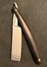 Old Pipe Razor by GEORGE WOSTENHOLM picture