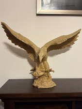 Handcrafted sculpture of a majestic eagle soaring picture