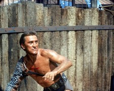 Kirk Douglas US actor wearing chain mail protection his right arm - Old Photo picture