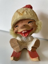 Henning Handmade Carved Wooden Gnome Figurine with Red Hat and Skis picture