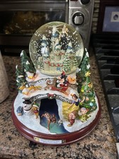 An Old Fashioned Disney Christmas Snow Globe Music Lights Bradford Exchange picture