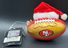 Official NFL San Francisco 49ers Team Ball Christmas Ornament wearing Santa hat picture