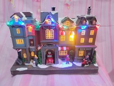 Moments in Time Nature's Mark Hotel Christmas Village Town LED Lights and Music picture