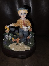 Vintage Resin Boy with Bicycle Holding White Dove Figurine in Field of... picture