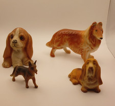 Vintage Dog figurine lot of 4 various sizes Used excellent condition picture