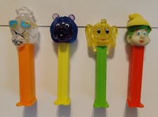 Lot Of 4 PEZ DISPENSERS Alpine boy Kooky Elephant Sourz Pineapple Crystal Lion picture