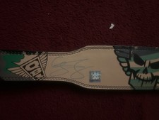 cody rhodes signed weight belt picture