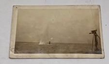 WWI RPPC Photo postcard U.S.S. Dakota firing at submarine BY Jones & Pruitt picture