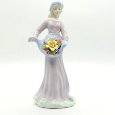 Porcelain Lady Figurine Holding Flowers in Apron Sculpture Women Glazed Statue picture