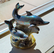 Iridescent Porcelain Dolphin Figurine Sculpture on Coral Reef Base picture
