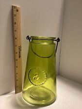 Vintage genuine and crafted green glass vase with metal handle picture