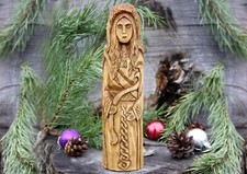 Norse goddess of hunting Skadi. Hand crafted large wooden statue of Skadi picture
