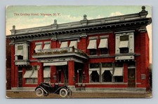 Postcard NY Warsaw New York The Gridley Hotel Building vintage car picture