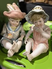 Pair of Vintage Porcelain Piano Baby Figurines Boy and Girl Sitting picture
