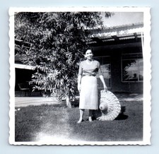 Old Vintage Square Photo SOLO LEGGY WOMAN IN YARD WIDE BRIMMED HAT SNAPSHOT picture
