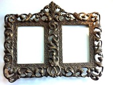 Beautiful vintage double picture frame featuring an elegant, ornate Rococo/Bar picture