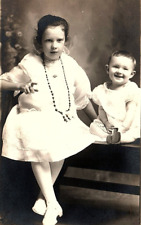 c1915 CHILDREN SMILING BABY WITH POINTING GIRL RPPC POSTCARD P781 picture