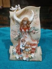 Southern Hospitality 8 in. Wind Up Musical Angel Standing Over 2 Kids Figurine picture