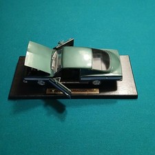 1/18 Scale Dicast Model Of A 1969 Plymouth Barracuda Dark Green & White Stripes picture