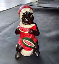 Vintage cast iron girl eating watermelon picture