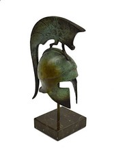  Helmet with winged figure Ancient Greek marble based helmet artifact picture