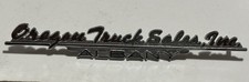 Vintage Metal Dealership Emblem - Oregon Truck Sales, Albany Oregon picture