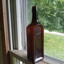 MUNYON'S PAW PAW EMB TREE 1890s AMBER 10 1/8