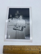 Vintage 1953 Photo of Pretty Girl Holding Birthday Present picture
