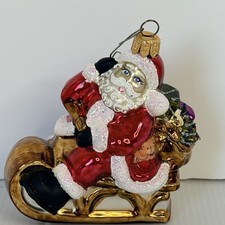 Sewerynski Poland Mouth Blown Glass Christmas Ornament Santa Reclining in Sleigh picture