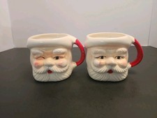 Vtg 2 Japan Santa Claus 1 Winking & 1 With Eyes Open Christmas Ceramic Mugs  picture