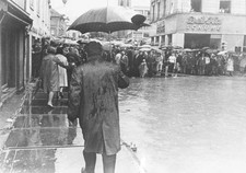 The main square of Villach during a bad weather front with floodin- Old Photo picture