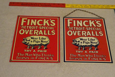 VINTAGE FINCK'S DETROIT OVERALLS WEAR LIKE PIG NOSE SIGN LOT OF2 PORCELAIN METAL picture