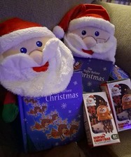 2 Holiday books with Santas And 2 Dancing Ornaments picture