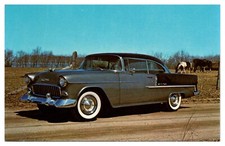 Postcard 1955 Chevrolet Belair Sport Coupe Black on Gray Wide White Wall Tires picture