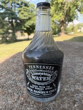 JACK DANIEL’S TENNESSEE LIMESTONE WATER BOTTLE FULL WITH LID 1/2 GALLON 1972 picture