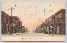 Main Street New Hampton Iowa 1907 Street View Business Buildings Postcard picture
